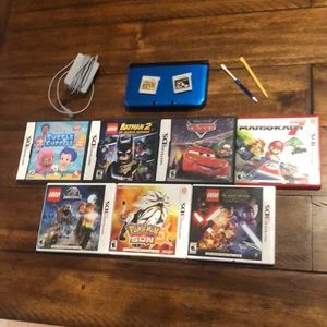 Nintendo 3DS XL gaming console with games/ charger